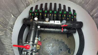Figure 5: Piping manifold secondary distribution piping to geothermal bore field. Courtesy: CDM Smith