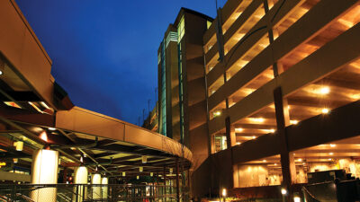 Figure 2: In previous editions of the code, open parking garages like this one did not require automatic fire sprinkler protection. New code editions have eliminated sprinkler exceptions for open parking garages. Courtesy: CDM Smith