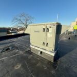 Figure 1: An energy recovery ventilator (ERV) unit installed at an administration building in Massachusetts. The ERV exchanges heat between the outdoor air and the ventilation from the occupied spaces. It operates in air-side economizer mode when the outdoor air temperature is below 60°F and modulates the outside air damper and return air damper to maintain the mixed air temperature setpoint. Courtesy: CDM Smith