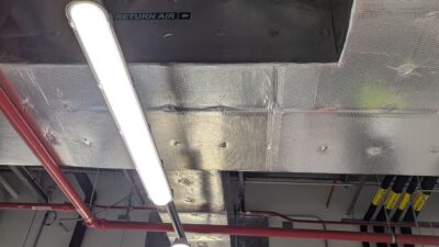 Figure 2: Indoor unit return ductwork with outside air connection via ducted louver. Courtesy: CDM Smith
