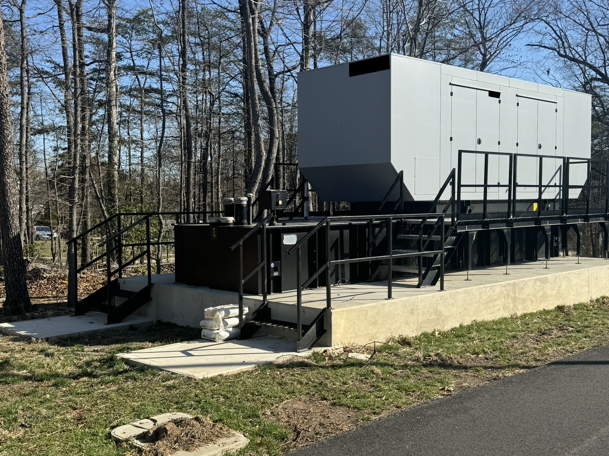 Figure 5. Diesel generator installed with access platform at a lab expansion. Courtesy: CDM Smith