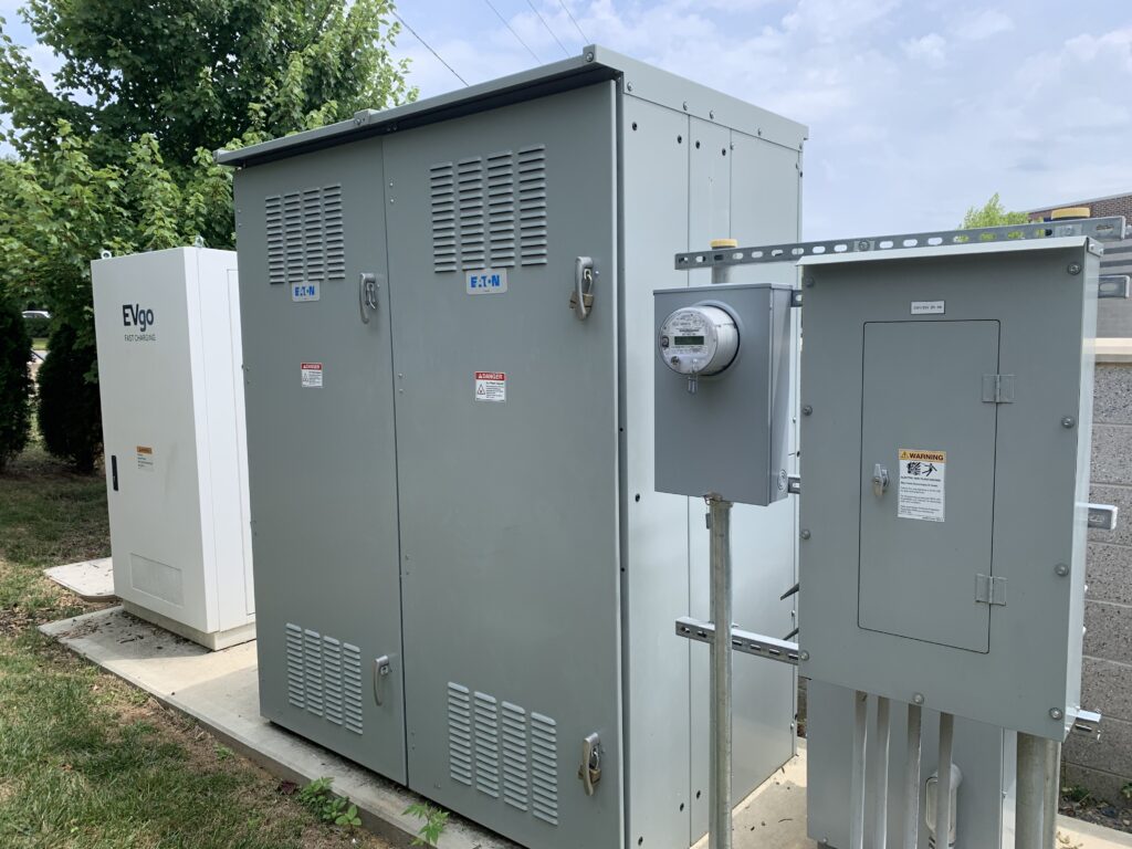 Figure 1: From left to right: EVgo power cabinet, 480V switchgear, utility meter, 120/208 volt lighting panelboard, 480–120/208V transformer (behind panelboard). Courtesy: CDM Smith