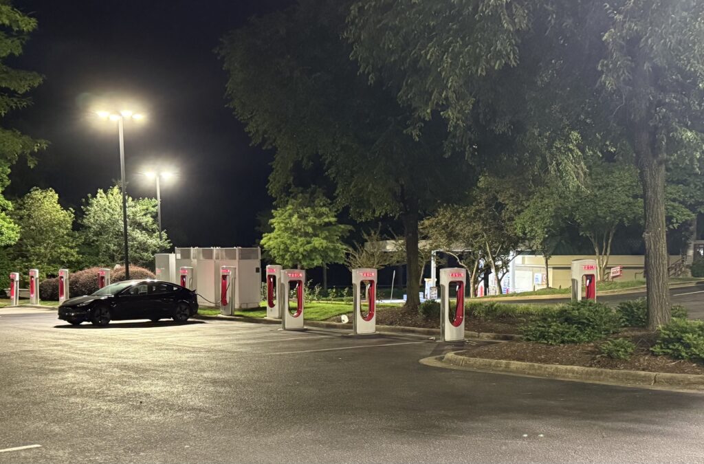 Figure 5: A Tesla charging station is pictured at night with adequate lighting. Courtesy: CDM Smith