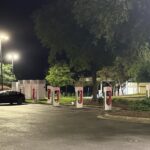 Figure 5: A Tesla charging station is pictured at night with adequate lighting. Courtesy: CDM Smith