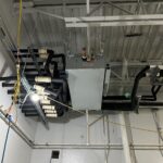 Figure 2: A heat recovery variable refrigerant flow branch controller in a mechanical room. Courtesy: CDM Smith