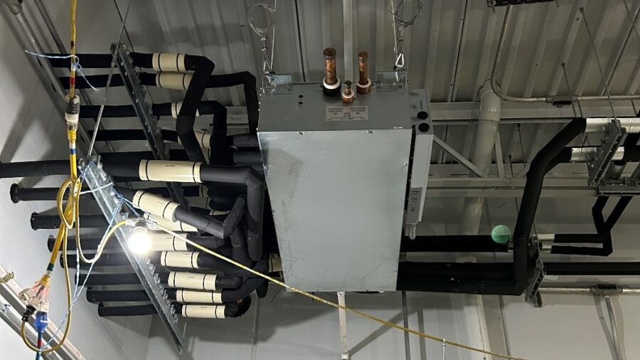 Figure 2: A heat recovery variable refrigerant flow branch controller in a mechanical room. Courtesy: CDM Smith
