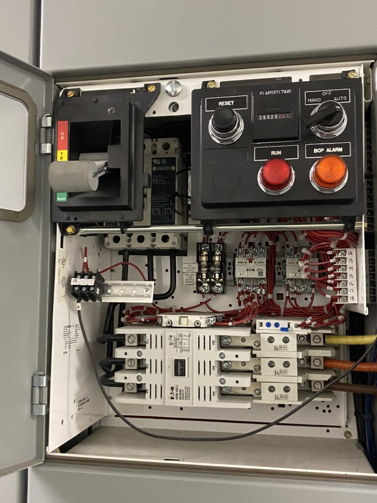 Figure 2: Motor branch-circuit protective device and motor starter installed in a motor control center bucket at a wastewater treatment facility. Courtesy: CDM Smith