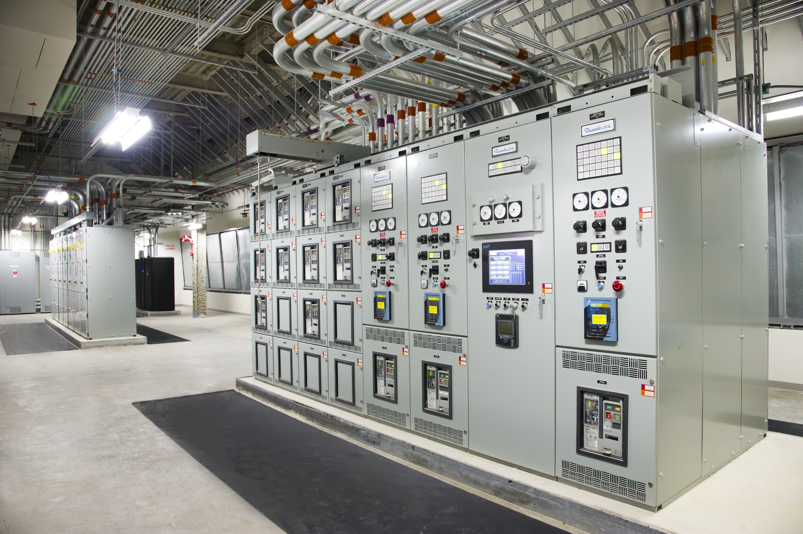 Figure 3: Example of paralleling switchgear with touchscreen interface and three generator control sections. Unseen are the hot-swappable, dual redundant programmable logic controllers. Courtesy: Kevin G. Reeves, CannonDesign
