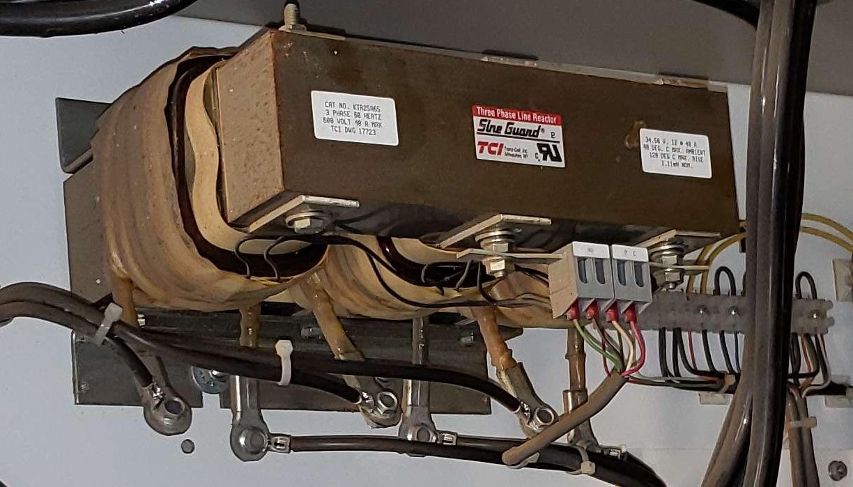 Figure 2: A line reactor inside a variable frequency drive (VFD) enclosure used on the input side of the VFD. Courtesy: CDM Smith