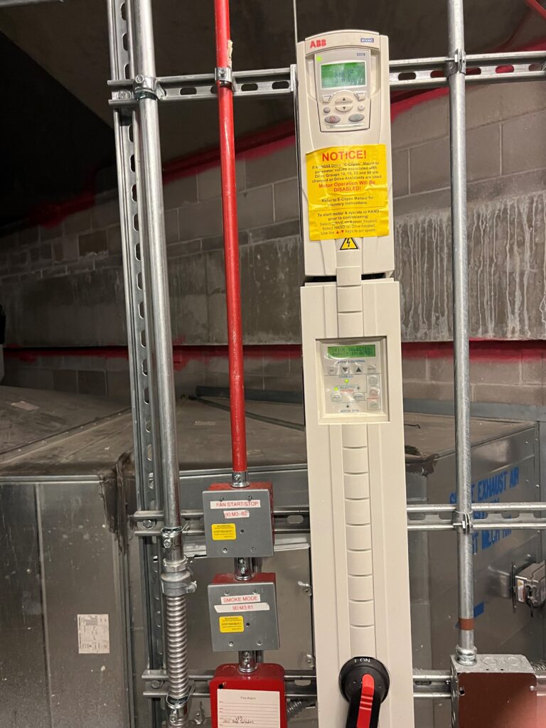 Figure 4: Smoke control fan variable frequency drive with control wiring in metal conduit. Courtesy: Jensen Hughes Inc.