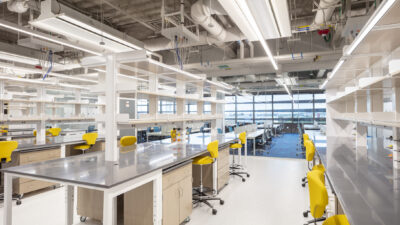 Research labs use ambient linear lighting controlled via occupancy sensors and local switching with full dimming capability. Supplemental task lighting is provided by lab-bench-integrated task lights with individual control and occupancy sensing. Courtesy: Warren Jagger Photography, Arup