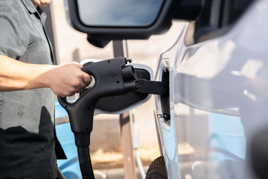 Figure 2: Charging electric vehicle (EV) with combined charging standard connector. Courtesy: CDM Smith