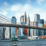 Suspension Brooklyn Bridge across Lower Manhattan and Brooklyn. New York, USA. Courtesy: BRIAN_KINNEY – stock.adobe.com