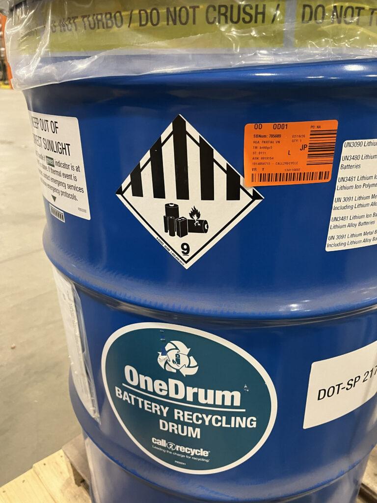 Figure 2: Battery recycling drum for battery storage and transport, showing hazardous materials labeling and handling warnings. The container illustrates the use of dedicated packaging to manage damaged, end-of-life or recycled batteries. Courtesy: Telgian Engineering & Consulting