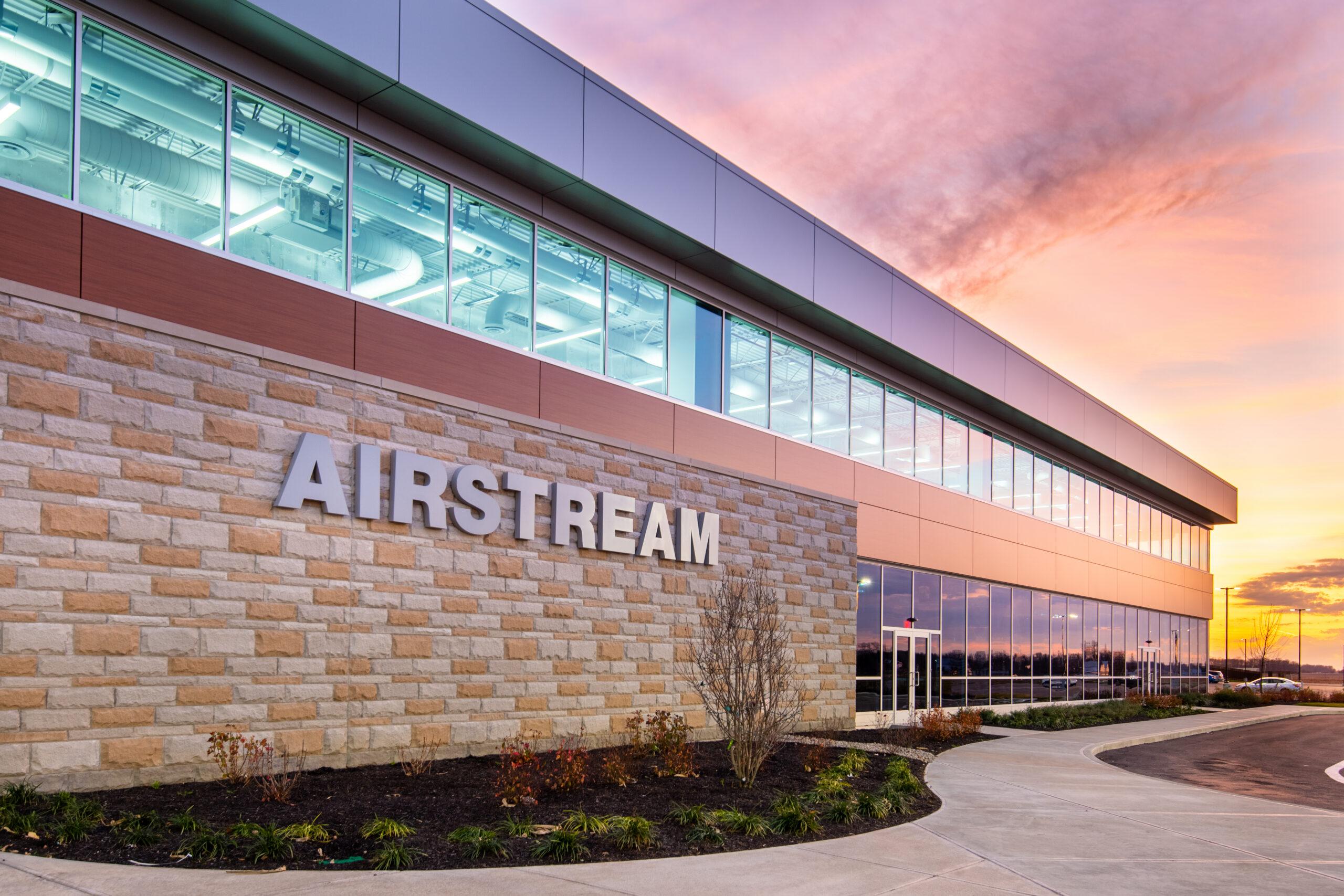 IMEG provided MEPFP engineering, commissioning and construction administration services for Airstream’s new 757,750-square-foot production facility in Jackson Center, Ohio. The greenfield expansion consolidated multiple manufacturing operations into a single modern facility designed to improve operational efficiency, workforce training and long-term production flexibility. Courtesy: Bella Photographics/IMEG