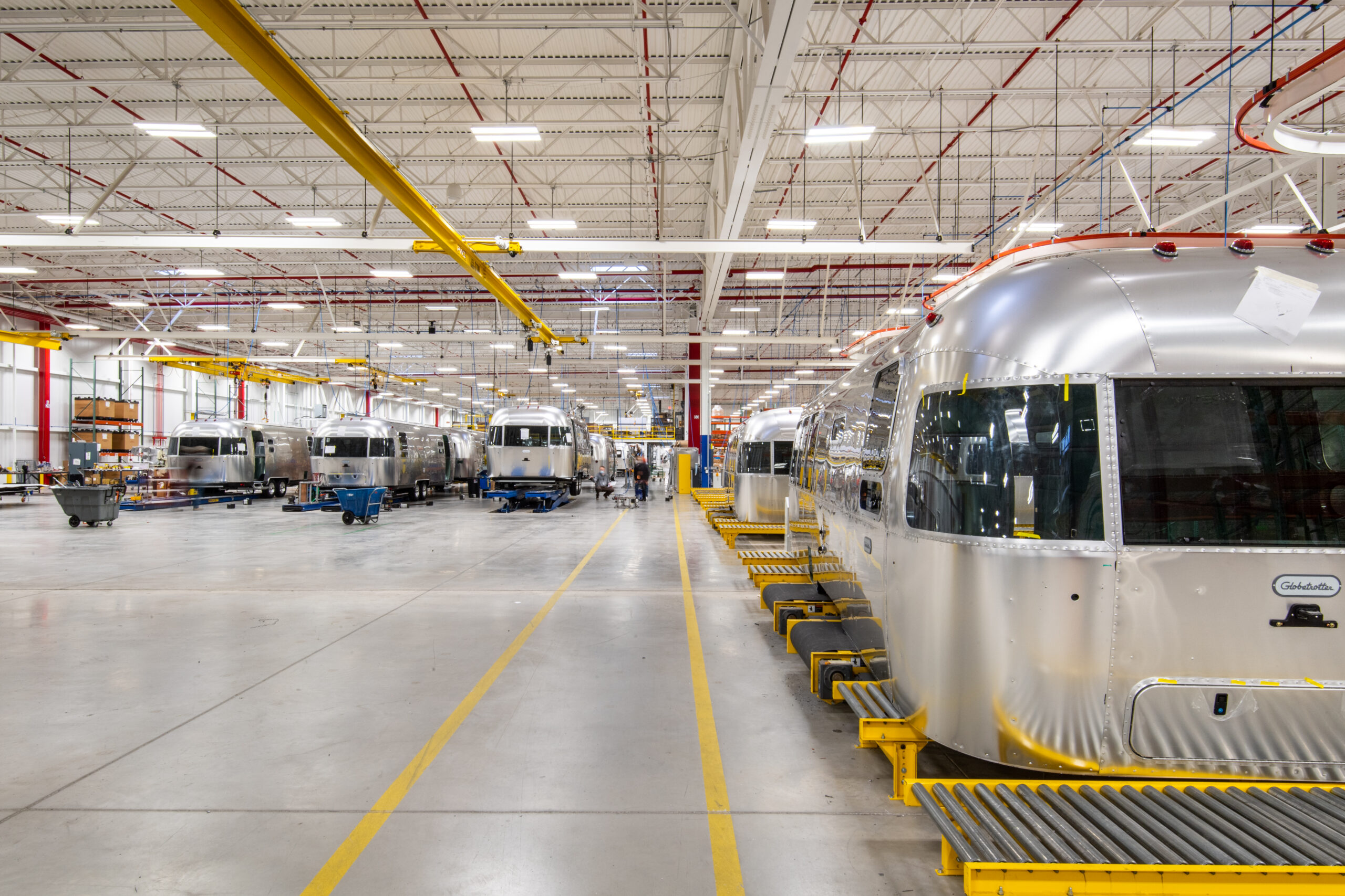 The 757,750-square-foot Airstream production facility was designed to support large-scale manufacturing operations with flexible production space, integrated material handling systems and high-bay infrastructure optimized for operational efficiency and long-term adaptability. Courtesy: Bella Photographics/IMEG