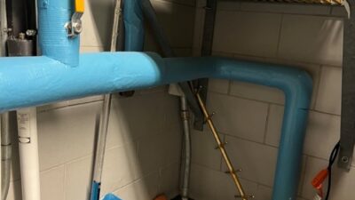 Figure 1: Incoming domestic water entrance through concrete slab (bottom right). Courtesy: CDM Smith