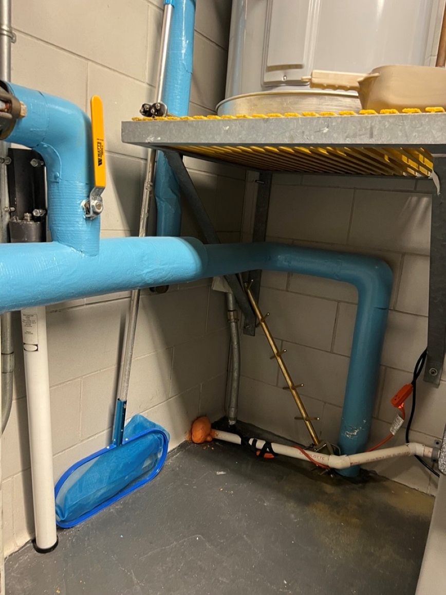 Figure 1: Incoming domestic water entrance through concrete slab (bottom right). Courtesy: CDM Smith
