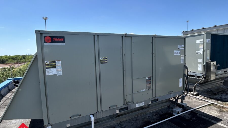 Figure 1: Unitary packaged rooftop unit with an outdoor air intake hood. Courtesy: CDM Smith