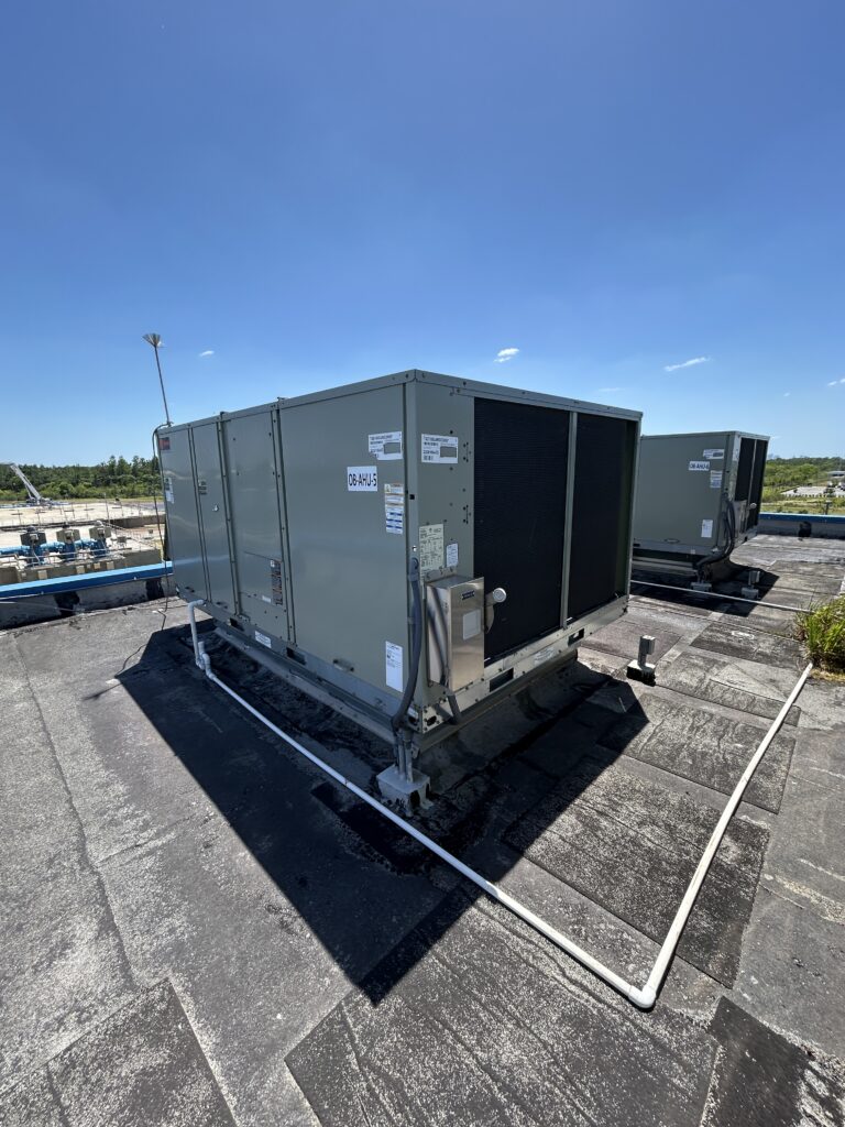 Figure 3: Packaged rooftop unit with condensate piping. Courtesy: CDM Smith