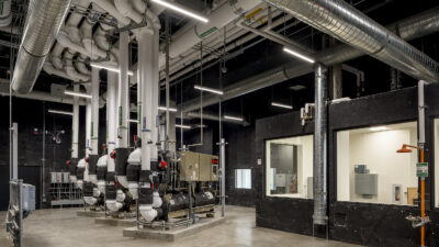 Ohlone Community College District Academic Core Building. Reversible heat pump chillers in tandem with a geothermal bore field provide heating and cooling to the facility and additional parts of the campus. Courtesy: CannonDesign