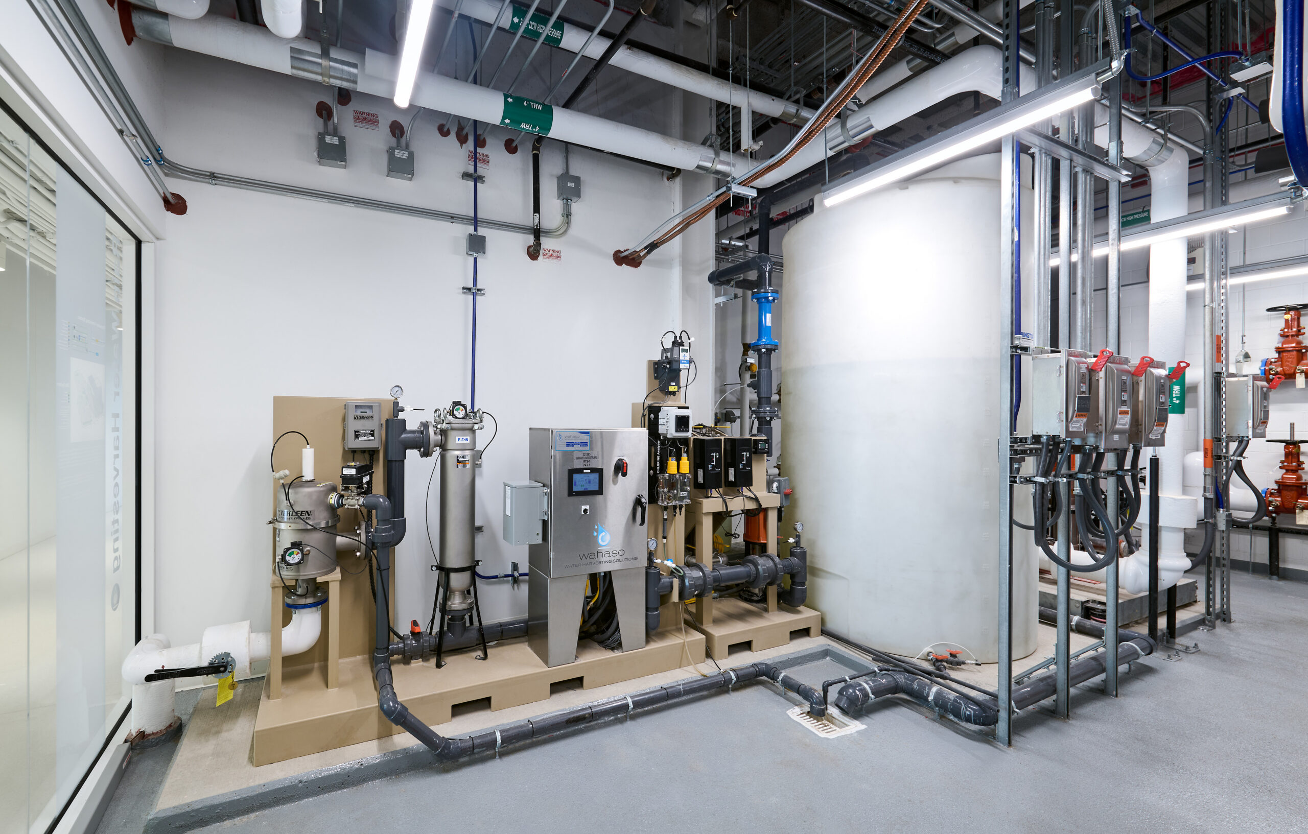 Figure 5: Virginia Tech’s Innovation Campus Academic Building 1 plumbing room with rainwater harvesting system. Courtesy: SmithGroup